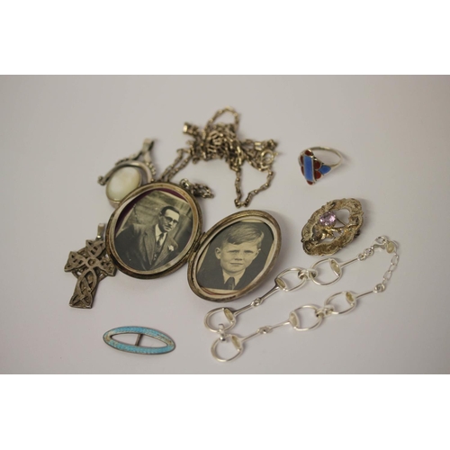 630 - A large oval silver locket on a chain, horse bit silver bracelet, rings brooch etc