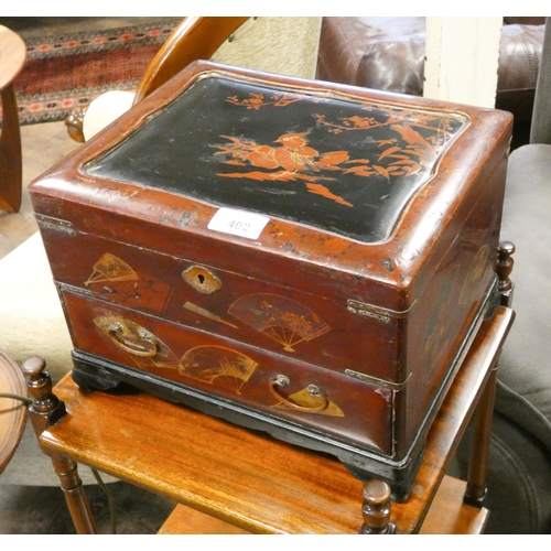 402 - A Chinese red lacquered box with fitted interior and one drawer