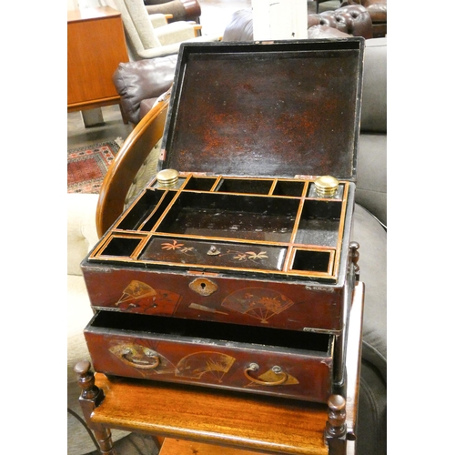 402 - A Chinese red lacquered box with fitted interior and one drawer