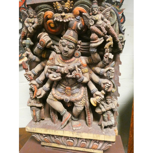 416 - A carved Indian temple depiction of Dancing Deity - possibly Lakshmi,  on a later wooden base, heigh... 