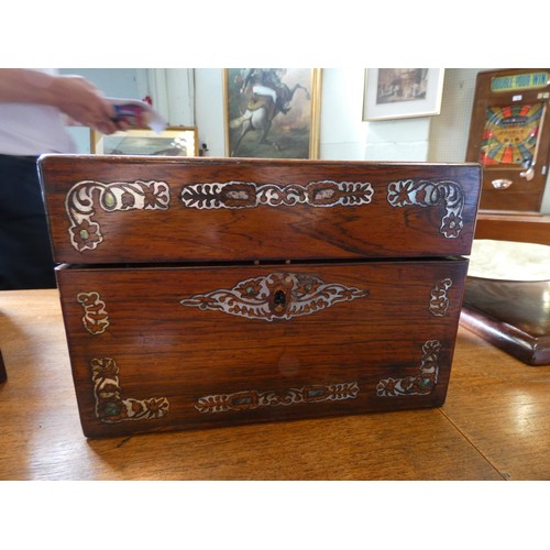 311 - A mother of pearl inlaid rosewood fitted toilet case, 10