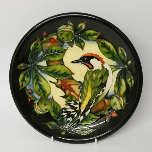 153 - Moorcroft Pottery 'Inglewood-Woodpecker' pattern plate, designed by Philip Gibson, 26cm diameter app... 