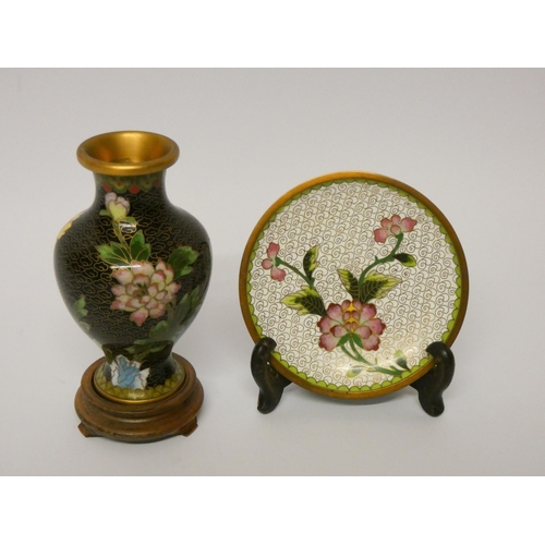 154 - A miniature Chinese cloisonné plate on stand and a miniature vase on hardwood stand. Vase 12.5cms ta... 