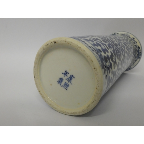 155 - A 19th century Chinese cylindrical vase with blue and white painted floral decoration  26cms tall, f... 