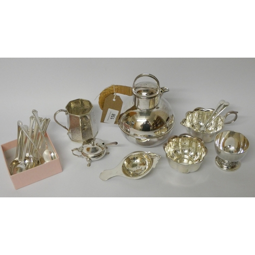 158 - Silver plate - an Arts & Crafts water jug, christening tankard, spoons , tea strainer and stand etc