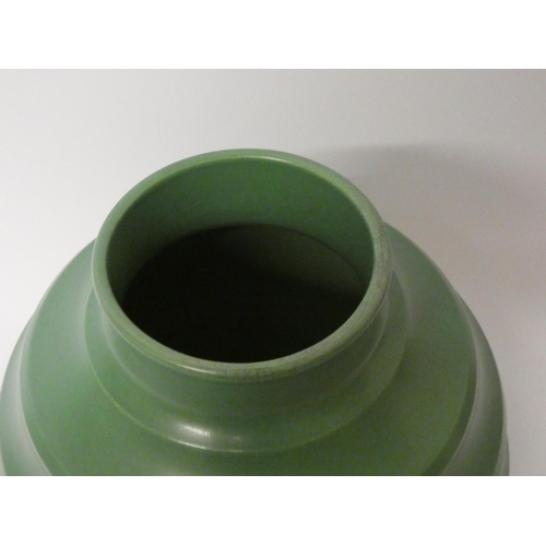 160 - Keith Murray for Wedgwood, a green glazed banded globular vase, 18cm high