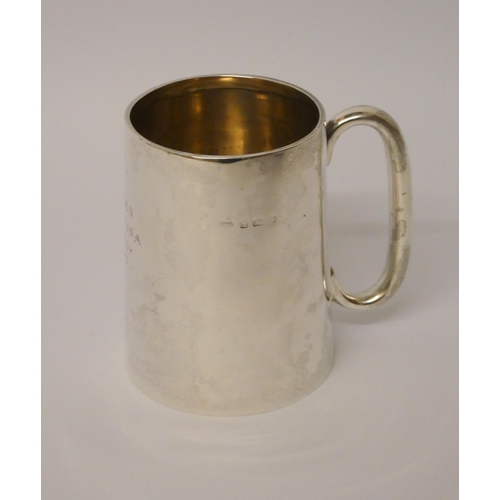 504 - A modern silver Christening tankard, of plain form, with inscription dated 1943. Birmingham marks. W... 