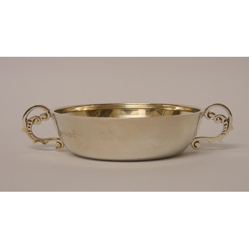 513 - A silver porringer, of plain form, Birmingham 1949. 12 cms across 2.75troy oz.