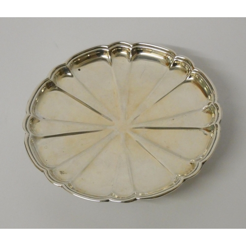 515 - A miniature footed silver salver, of circular segmented form, Sheffield 1910 - Roberts & Belk, 11.5 ... 