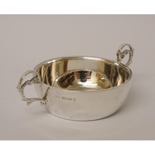 517 - A silver porringer, of plain form, Birmingham 1977. 12 cms across