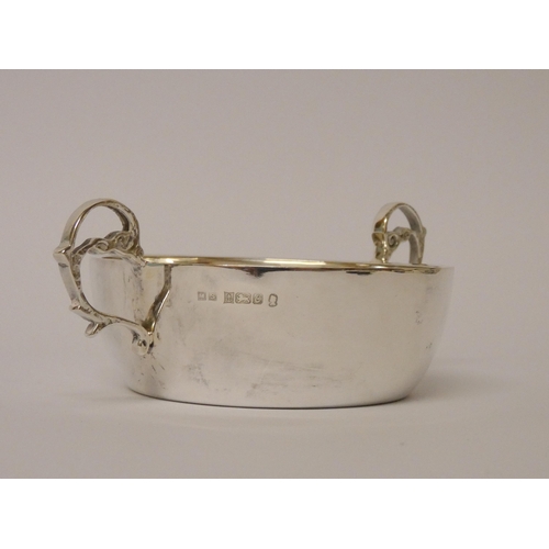 517 - A silver porringer, of plain form, Birmingham 1977. 12 cms across