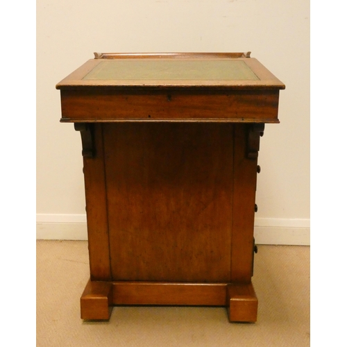 61 - A Victorian mahogany Davenport fitted four drawers with green leather slope, 21