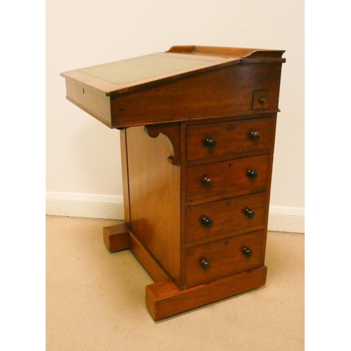 61 - A Victorian mahogany Davenport fitted four drawers with green leather slope, 21