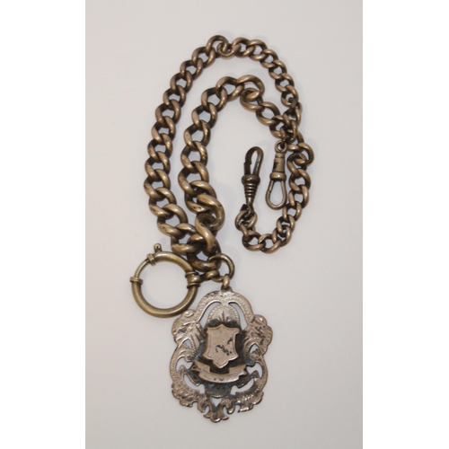 427 - A Victorian silver graduated curb link albert chain with silver medallion attached. 73.2g