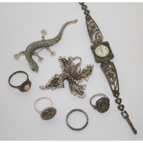 431 - A collection of silver and marcasite jewellery - t o include brooches, dress watch, rings etc