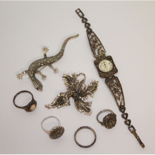 431 - A collection of silver and marcasite jewellery - t o include brooches, dress watch, rings etc