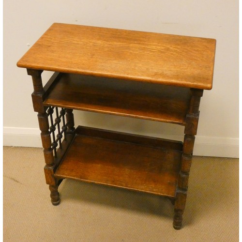 63 - An Arts & Crafts oak three tier side or occasional table with bobbin turned sides, 25