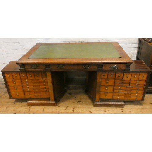 68 - An early 20th century Shannon File Company Limited oak pedestal desk with fold away index cabinet pe... 