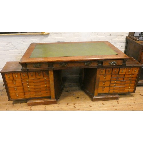 68 - An early 20th century Shannon File Company Limited oak pedestal desk with fold away index cabinet pe... 