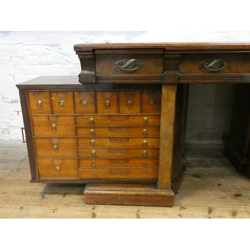 68 - An early 20th century Shannon File Company Limited oak pedestal desk with fold away index cabinet pe... 