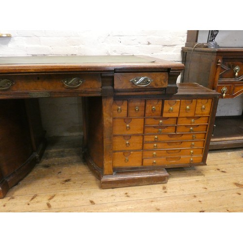 68 - An early 20th century Shannon File Company Limited oak pedestal desk with fold away index cabinet pe... 