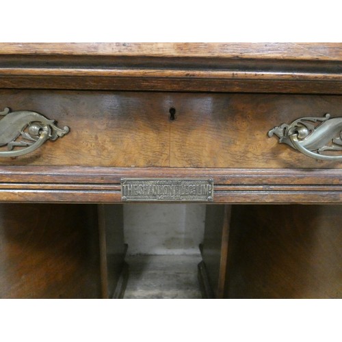 68 - An early 20th century Shannon File Company Limited oak pedestal desk with fold away index cabinet pe... 