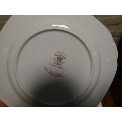 105 - A Royal Albert Foxglove pattern bone china tea set of 22 pieces - milk jug has a small crack