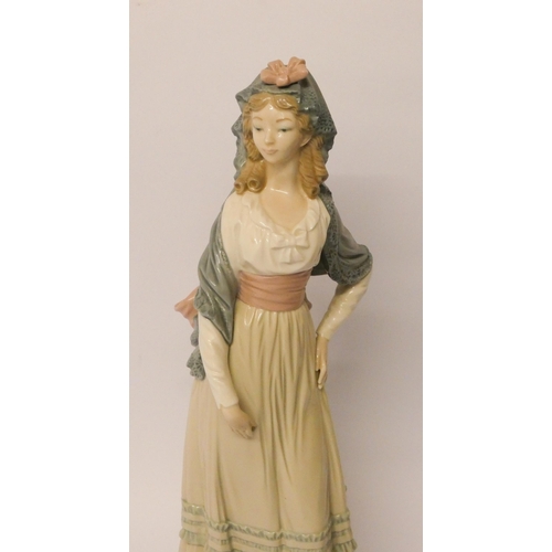 168 - A Lladro lady figure with a pink sash, 12 1/2