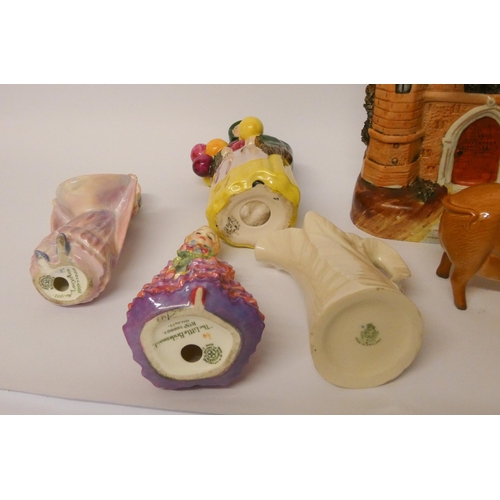 171 - A Beswick donkey, Royal Doulton pig, Balloon lady, two small Doulton figures, Staffordshire castle o... 