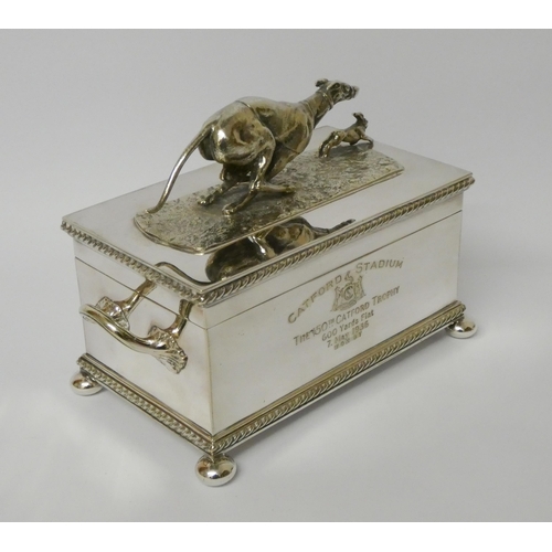 521 - Greyhound racing interest - A quality silver plated box, the hinged lid with greyhound and rabbit mo... 