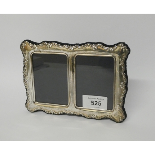 525 - A modern silver twin photograph frame, with easel fitting. 16.5cms wide and 12cms high