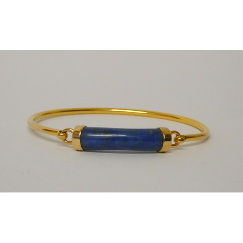 415 - Gucci - A 9ct yellow gold and lapis panel bracelet