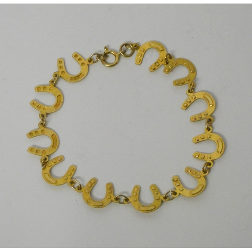 485 - 9ct yellow gold horseshoe motif bracelet, hallmarked, 3.4gms