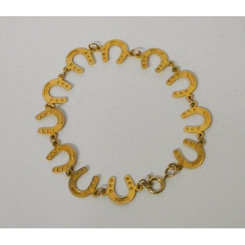 485 - 9ct yellow gold horseshoe motif bracelet, hallmarked, 3.4gms