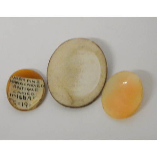 498 - Three 19th century unmounted oval cameos - largest is ceramic, height 41mm