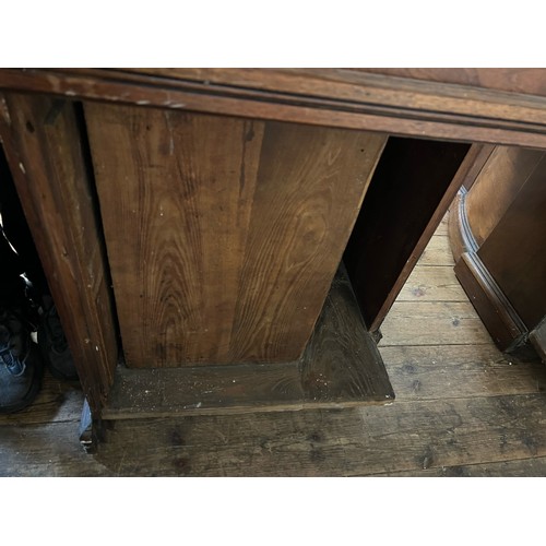 68 - An early 20th century Shannon File Company Limited oak pedestal desk with fold away index cabinet pe... 