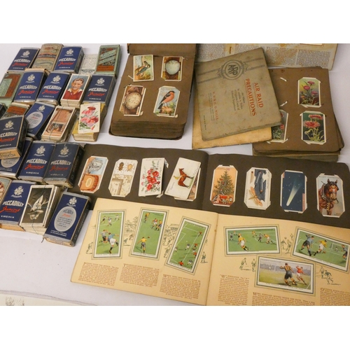 196 - A large collection of cigarette and tea cards, loose and in albums