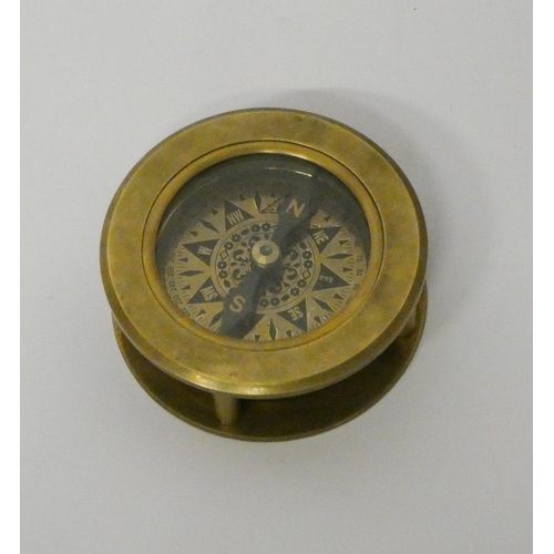 199 - A small brass handheld compass