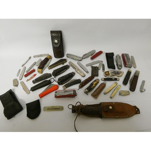 228 - A vintage penknife collection and an HMS Carinthia penknife