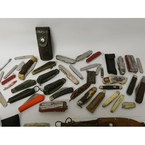 228 - A vintage penknife collection and an HMS Carinthia penknife