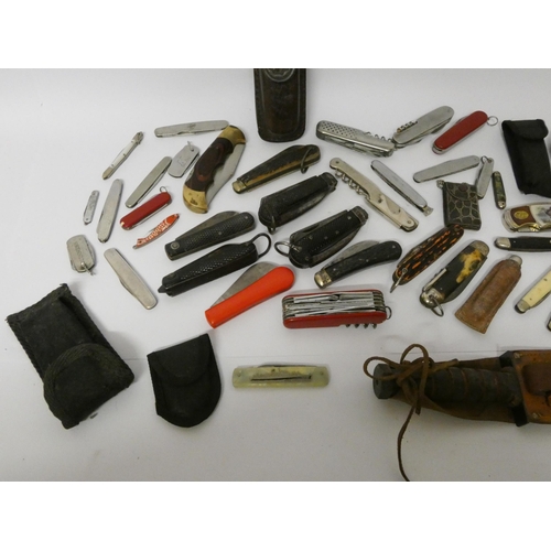 228 - A vintage penknife collection and an HMS Carinthia penknife