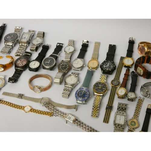 229 - A large quantity of gents and ladies quartz wristwatches