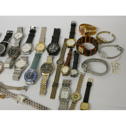 229 - A large quantity of gents and ladies quartz wristwatches