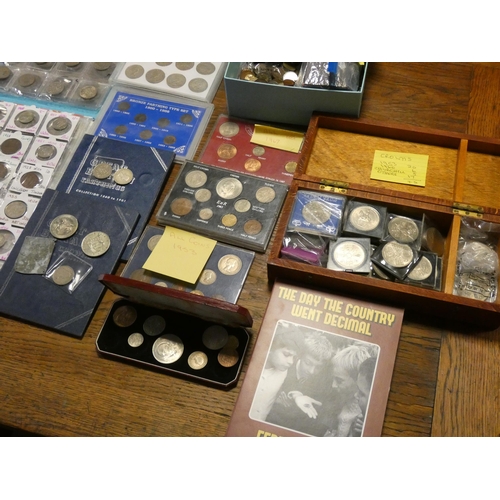 233 - A very large collection of English and foreign coins to include crowns and two albums of coins and b... 