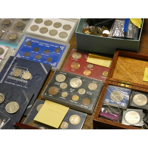 233 - A very large collection of English and foreign coins to include crowns and two albums of coins and b... 