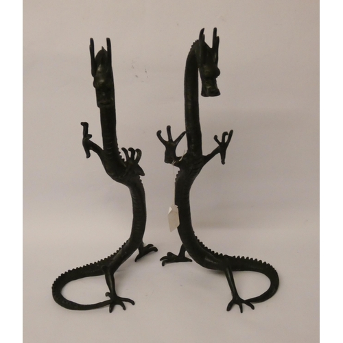 236 - A pair of Chinese bronze rearing dragons