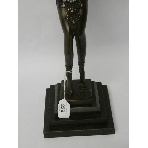 238 - A French Art Deco style bronze dancing lady figure on square stepped onyx base