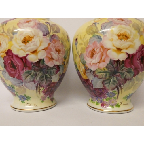 239 - A pair of Japanese hand painted bulbous vases decorated with roses and signed J Kato, 10