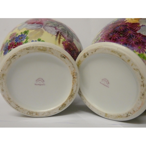 239 - A pair of Japanese hand painted bulbous vases decorated with roses and signed J Kato, 10