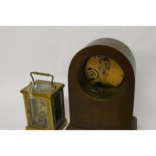 240 - An Edwardian inlaid mahogany oval mantle clock and a brass carriage clock